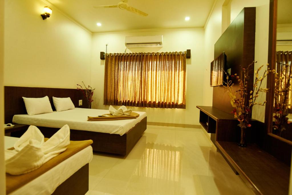 Hotel Pride Inn-Delux AC